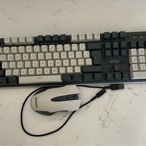 Red thunder k10 wireless gaming keyboard and M10 wireless gaming mouse.